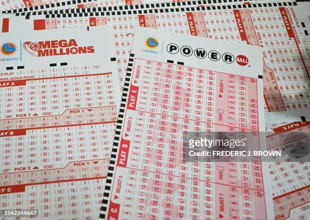 Mega Millions and Powerball lottery tickets are seen in San Gabriel, California, on July 19, 2023. The Powerball jackpot has reached 1 billion USD...
