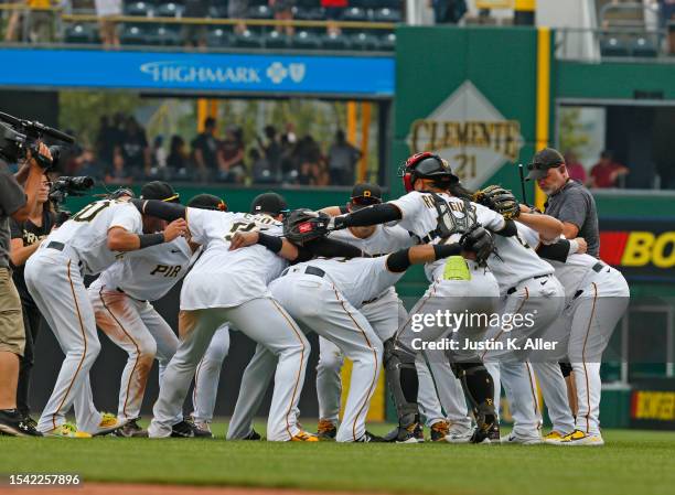 The Pittsburgh Pirates celebrate after defeating the Cleveland Guardians during inter-league play at PNC Park on July 19, 2023 in Pittsburgh,...