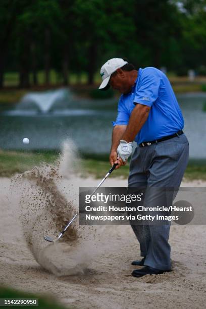 Danny Crowley, a professional golf teacher at Memorial Park Golf Course, demonstrates the use of a wedge on the 15th hole Monday, March 23 in...