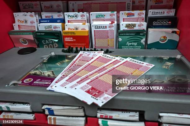 Powerball lottery tickets are pictured inside a store in Homestead, Florida on July 19, 2023. The Powerball jackpot has reached 1 billion USD for the...