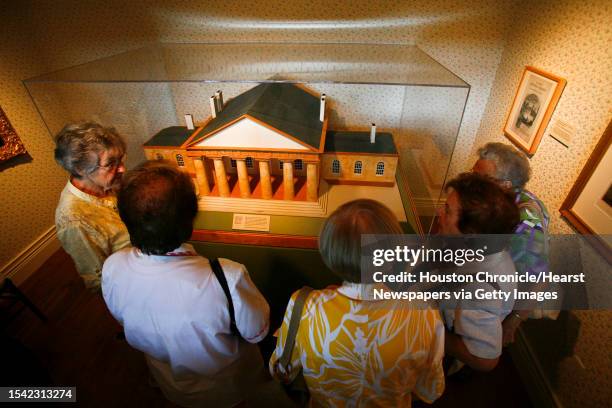 Members from the St. Elizabeth Ann Seton Catholic Church, look at an 1800's model of the Arlington House designed by George Hadfield, the architect...