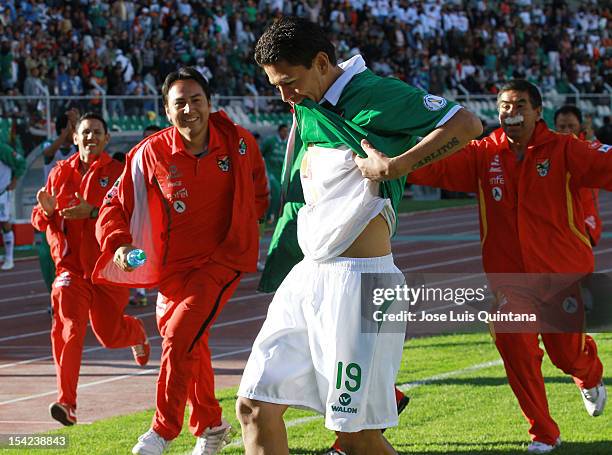 Carlos Saucedo of Bolivia celebrates a goal during a match between Uruguay and Bolivia as part of the South American Qualifiers for the FIFA Brazil...