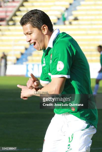 Carlos Saucedo of Bolivia celebrates a goal during a match between Uruguay and Bolivia as part of the South American Qualifiers for the FIFA Brazil...