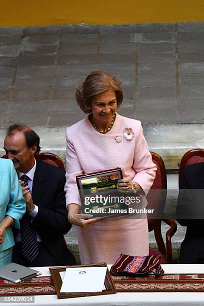 Queen Sofia holds the keys to the city of La Paz during theher visit to the National Art museum on October 16, 2012 in La Paz, Bolivia. Queen Sofia...