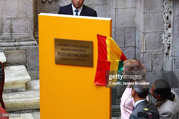 Queen Sofia unveils a plaque during her visit to the National Art museum on October 16, 2012 in La Paz, Bolivia. Queen Sofia is on a 4 day visit to...