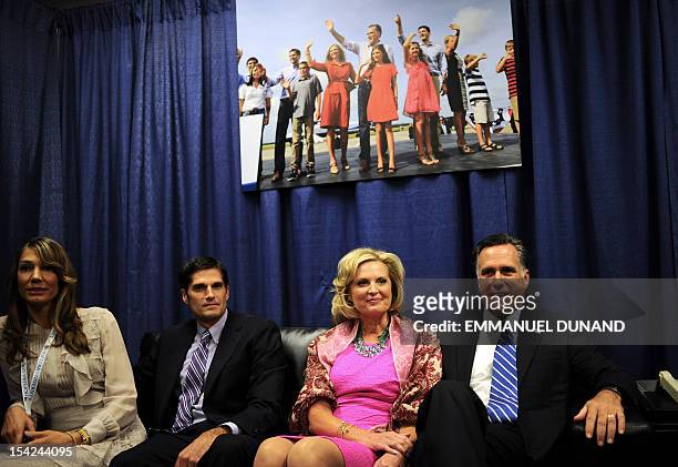 Republican Presidential candidate Mitt Romney, his wife Ann, his son Matt and Matt's wife Laurie await in a holding room, the start of the second...