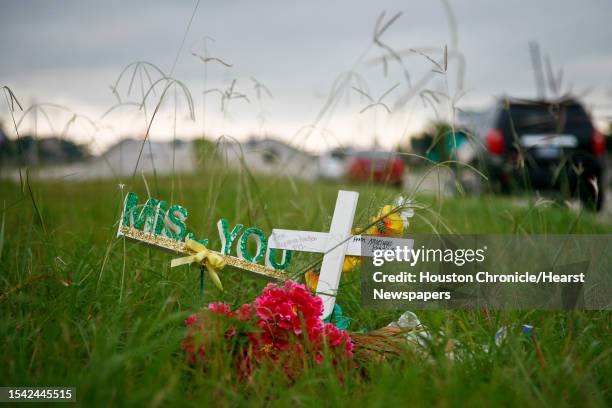 Roadside memorial rests on the grassy center median on South Main Street Friday, June 4 in Houston to honor a M.D. Anderson Cancer Center nurse...