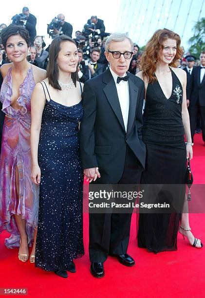 Actress Thiffani-Amber Thiessen, Soon-Yi Previn, her husband director Woody Allen and actress Debra Messing arrive for the opening ceremony at the...