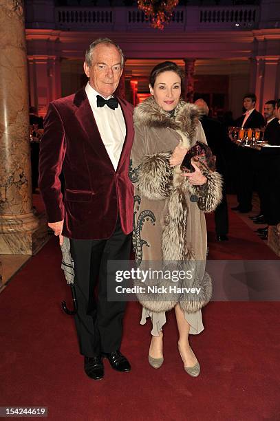 Simon Jenkins and Guest attend the Hollywood Costume gala dinner at the Victoria & Albert Museum on October 16, 2012 in London, England.
