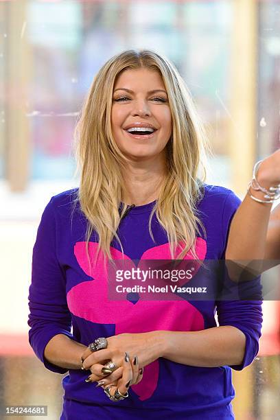 Fergie visits "Extra" at The Grove on October 16, 2012 in Los Angeles, California.