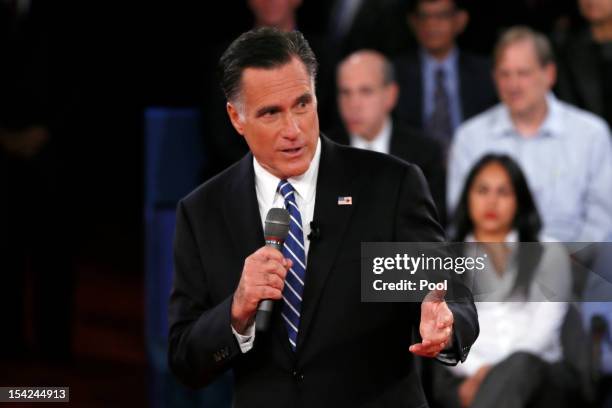 Republican presidential candidate Mitt Romney answers a question during a town hall style debate at Hofstra University October 16, 2012 in Hempstead,...