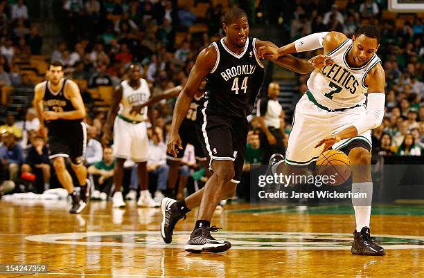 Jared Sullinger of the Boston Celtics fights for the ball against James Mays of the Brookyln Nets during the preseason game on October 16, 2012 at TD...