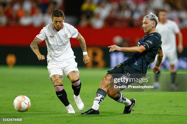 Alejandro Dario Papu Gomez of Sevilla FC and Mateo Carbajal of Independiente del Valle during the UEFA-CONMEBOL Club Challenge, XII Antonio Puerta...