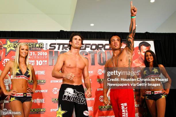 Noons and Jorge Gurgel react after weighing in for Saturday's Strikeforce MMA event at the Toyota Center Friday, Aug. 20 in Houston.