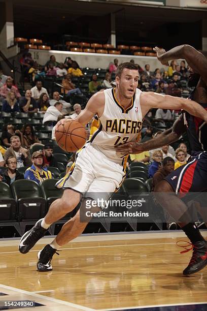 Miles Plumlee of the Indiana Pacers drives to the basket against the Atlanta Hawks on October 16, 2012 at Bankers Life Fieldhouse in Indianapolis,...