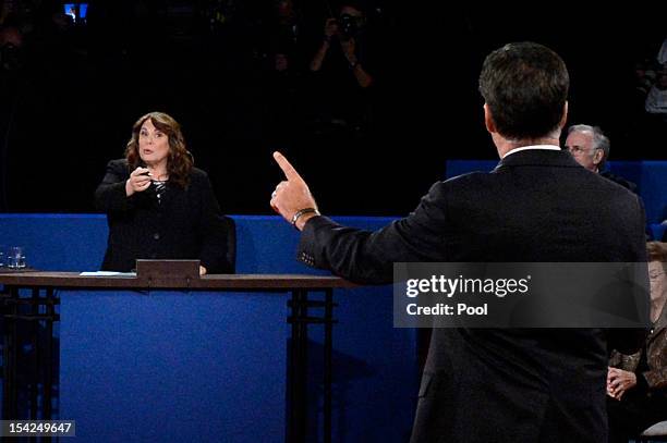 Moderator Candy Crowley and Republican presidential candidate Mitt Romney speak during a town hall style debate at Hofstra University October 16,...