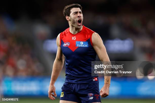 Christian Petracca of the Demons celebrates a goal during the round 18 AFL match between Melbourne Demons and Brisbane Lions at Melbourne Cricket...