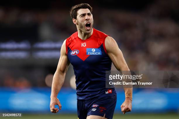 Christian Petracca of the Demons celebrates a goal during the round 18 AFL match between Melbourne Demons and Brisbane Lions at Melbourne Cricket...