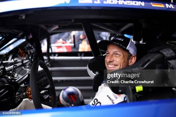 Jenson Button prepares to drive The NASCAR Garage 56 car up the 1.16 mile hill climb on during Day Two of the Goodwood Festival of Speed at Goodwood...