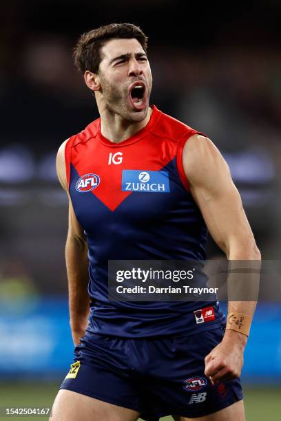 Christian Petracca of the Demons celebrates a goal during the round 18 AFL match between Melbourne Demons and Brisbane Lions at Melbourne Cricket...