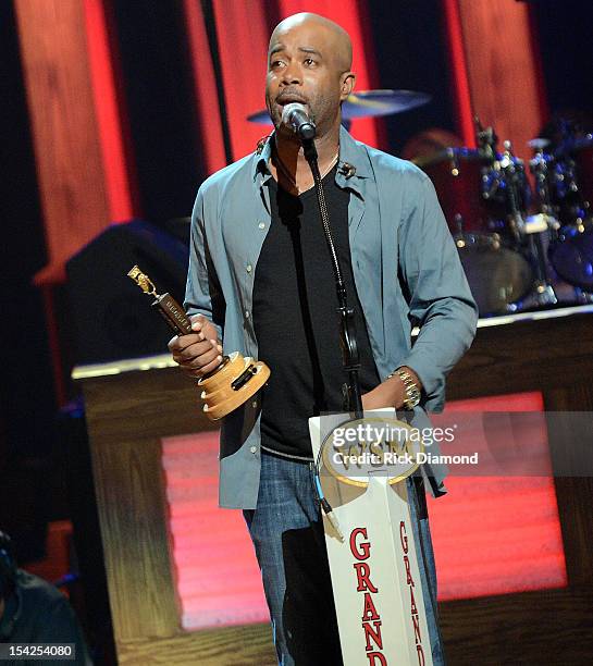 Newest member of the Grand Ole Opry Darius Rucker gets emotional during his induction into The Grand Ole Opry on October 16, 2012 in Nashville,...