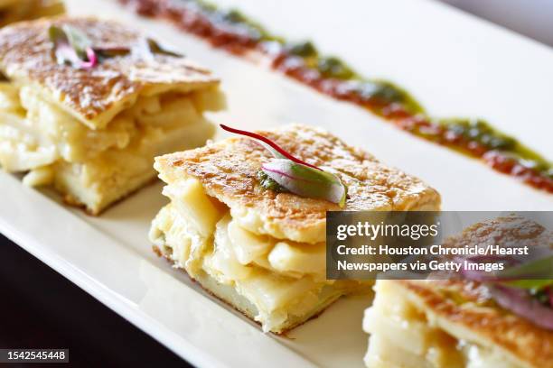 Tortilla Patatas at the new restaurant Convivio Tapas Bar & Lounge whose menu is almost entirely shaped around modern, contemporary tapas plates,...