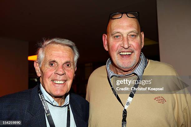 Werner Heine and Volkmar Gross pose during the Club of former national players meeting at Olympiastadion on October 16, 2012 in Berlin, Germany.