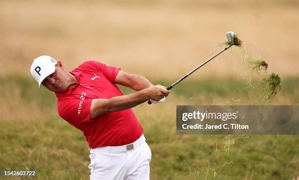 Gary Woodland of the United States plays a shot from the rough on the 18th hole during Day Two of the Genesis Scottish Open at The Renaissance Club...