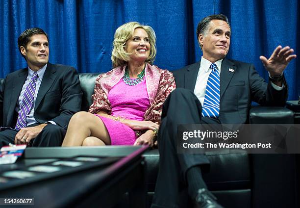 Ann Romney and Governor Mitt Romney chat with Matt Romney, left, and other members of the family while sitting in the "blue room" before the town...