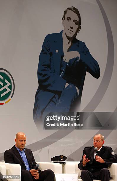 Donato Melillo , fan delegate of Hertha BSC Berlin and police officer Uwe Weise talks to the guests during the Julius Hirsch Award 2012 at Alten...