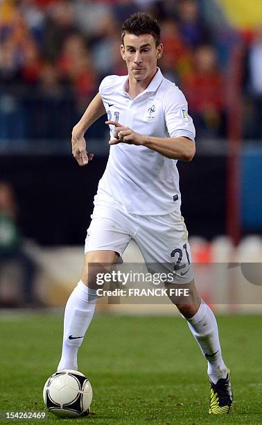 France's defender Laurent Koscielny controls the ball during the FIFA World Cup 2014 qualifying football match Spain vs France on October 16, 2012 at...