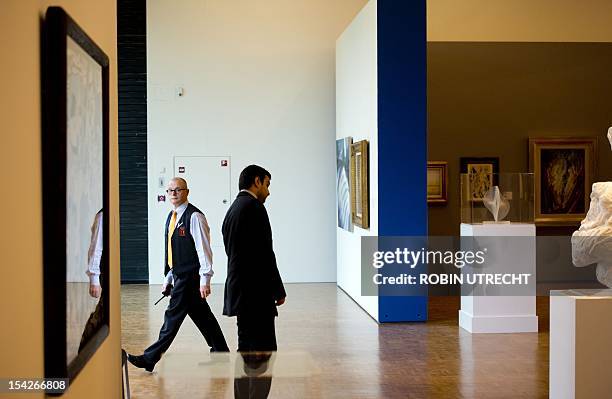 Guard walks in the Kunsthal museum in Rotterdam on October 17, 2012 a day after seven masterpieces worth up to 200 million euros were stolen from the...