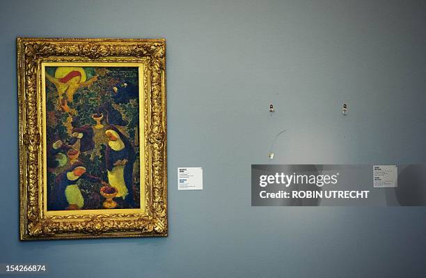 Empty space is seen on October 16, 2012 where a painting by French artist Henri Matisse was stolen at the Kunsthal museum in Rotterdam a day after...