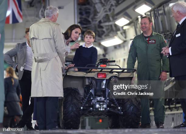 Prince Louis of Wales sits inside a vehicle on a C17 plane with Catherine, Princess of Wales during a visit to the Air Tattoo at RAF Fairford on July...
