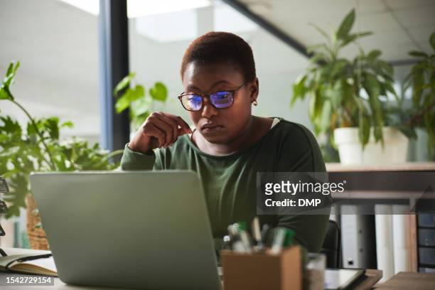 thinking, research and business woman reading, article review and editing or news analysis in office. focus, glasses reflection and african person, editor or journalist for online report on computer - employee feedback stock pictures, royalty-free photos & images