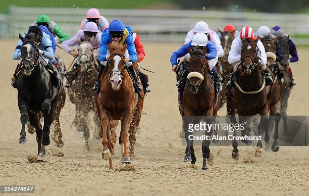 Eddie Ahern riding Correspondent win The Nat West Irish Stallion Farms EBF Maiden Stakes at Lingfield racecourse on October 17, 2012 in Lingfield,...