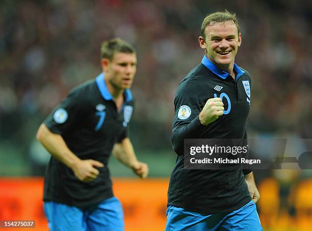 Wayne Rooney of England celebrates scoring to make it 1-0 during the FIFA 2014 World Cup Qualifier between Poland and England at the National Stadium...