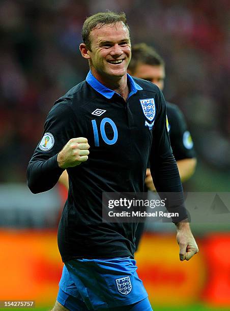 Wayne Rooney of England celebrates scoring to make it 1-0 during the FIFA 2014 World Cup Qualifier between Poland and England at the National Stadium...