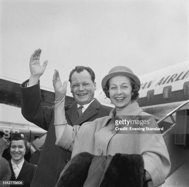 Willy Brandt , the Governing Mayor of West Berlin, and his wife Rut arrive at London Airport after attending the 70th anniversary celebrations of the...