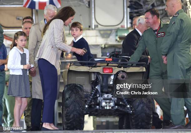 Prince Louis of Wales sits inside a vehicle on a C17 plane during a visit to the Air Tattoo at RAF Fairford with Catherine, Princess of Wales and...