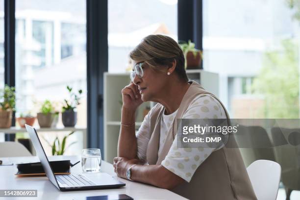 laptop, thinking and tired old woman at desk, secretary in office management and brainstorming online. internet, computer and stress, senior receptionist with brain fog at administration business. - brain fog stock pictures, royalty-free photos & images