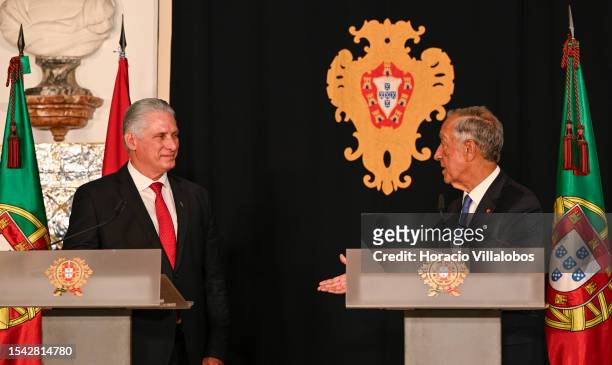 The President of Cuba Miguel Díaz-Canel listens as Portuguese President Marcelo Rebelo de Sousa delivers remarks to the press at end of their...