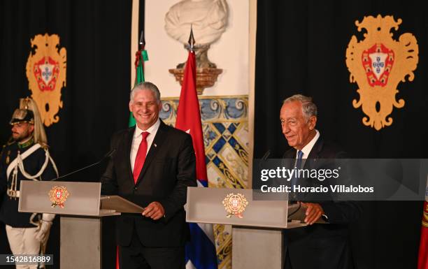 The President of Cuba Miguel Díaz-Canel smiles while listening to Portuguese President Marcelo Rebelo de Sousa delivering remarks to the press at end...