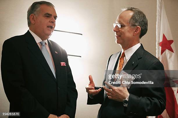 Transportation Secretary Ray LaHood and JetBlue CEO Dave Barger talk during an Aero Club luncheon at the Captial Hilton October 17, 2012 in...