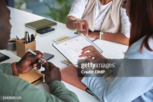 Business meeting, graph and digital tablet for people in office with budget, statistics and review. Financial, analysis and finance team online with chart, collaboration and budget planning or target Business meeting, graph and digital tablet for people in office with budget, statistics and review. Financial, analysis and finance team online with chart, collaboration and budget planning or target