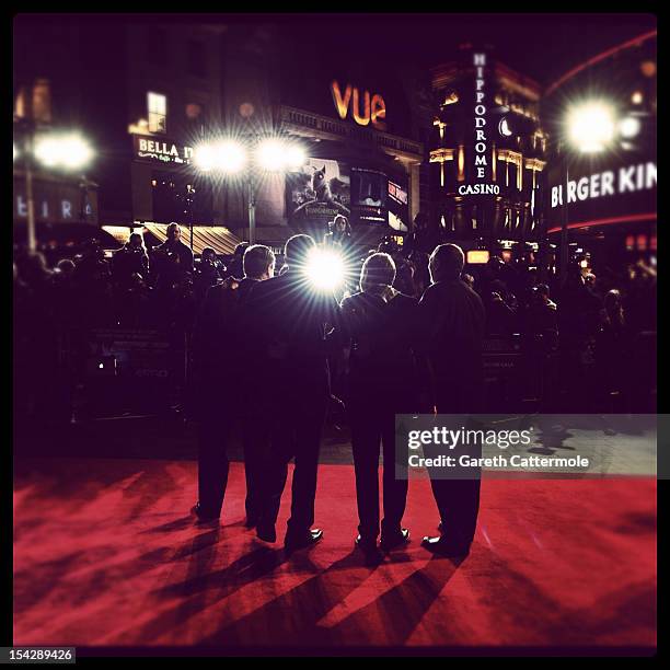 Actor John Goodman, actor/director Ben Affleck, actor Bryan Cranston and executive producer Graham King attend the premiere of "Argo" during the 56th...