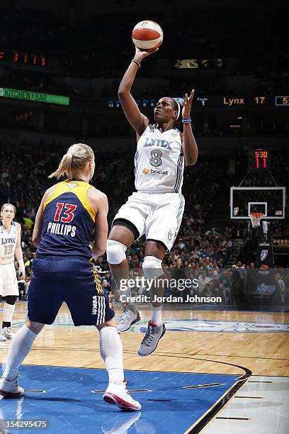 Taj McWilliams-Franklin of the Minnesota Lynx shoots the ball against Erin Phillips of the Indiana Fever during the 2012 WNBA Finals Game Two on...