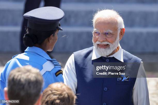 India's Prime Minister Narendra Modi attends the annual Bastille Day military parade on July 14, 2023 in Paris, France. France prepares to celebrate...