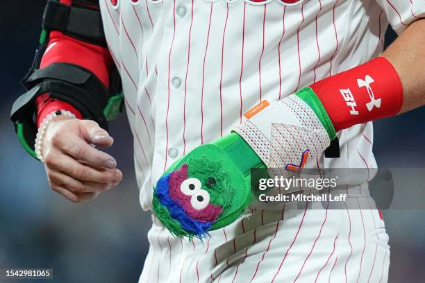 Detailed of the a Phillie Phanatic sliding mitt worn by Bryce Harper of the Philadelphia Phillies in the bottom of the ninth inning against the...