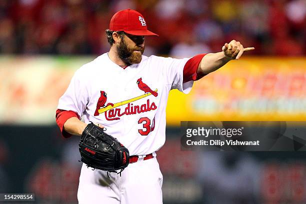 Jason Motte of the St. Louis Cardinals reacts in the eighth inning while taking on the San Francisco Giants in Game Three of the National League...